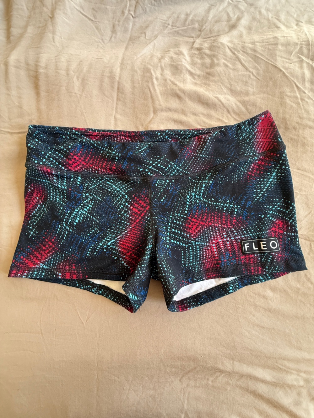 Fleo Women’s High-Rise Bike Shorts — Black with Red & Teal Print